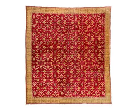 A LARGE AGRA CARPET  NORTH INDIA, LATE 19TH CENTURY approximately 400 x 390cm    Condition Report:  Wear to carpet overall co