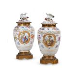 PAIR OF BERLIN-STYLE PORCELAIN GILT-METAL-MOUNTED VASES AND COVERS, GERMAN