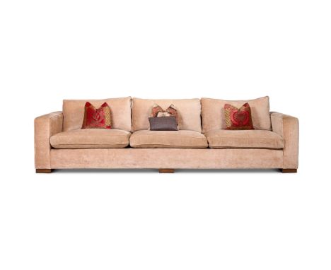 A LARGE UPHOLSTERED SOFA MODERN 66cm high, 313cm wide, 98cm deepTogether with four matching stools 38cm high, 35cm diameter  