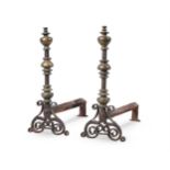 A PAIR OF FRENCH BRONZE AND WROUGHT IRON ANDIRONS, LATE 16TH/EARLY 17TH CENTURY