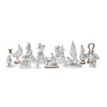 A COLLECTION OF CONTINENTAL BISCUIT PORCELAIN FIGURES