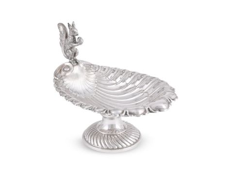 AN ELECTROPLATED SQUIRREL NUT DISH  LATE 20TH CENTURY With a squirrel finial to the scallop shell shaped bowl, on a circular 