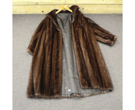 A ladies vintage fur coat