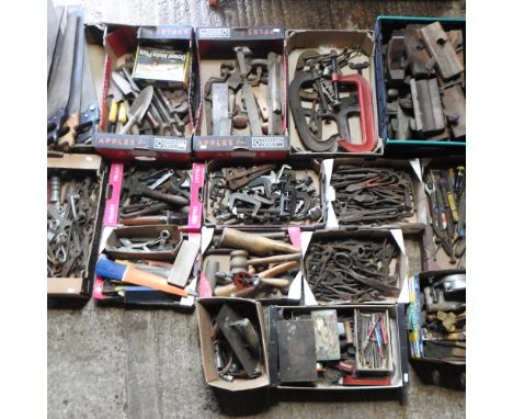 A large collection of workshop hand tools