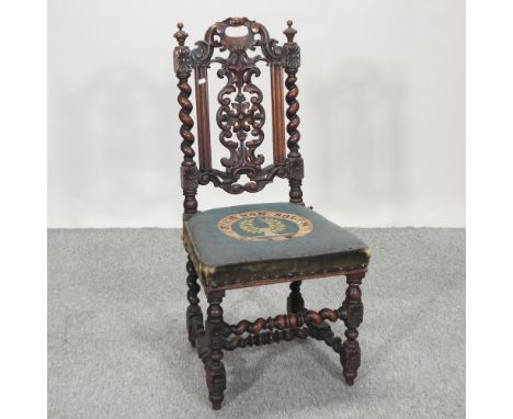 A 19th century carved walnut hall chair, with a tapestry seat