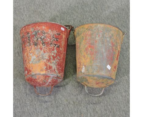 A vintage red painted fire bucket, 72cm, together with another smaller