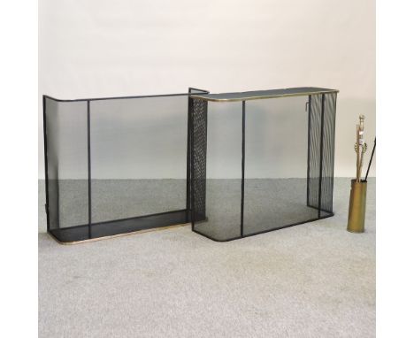 A brass mounted spark guard, 83cm, together with another, and a collection of fire tools
