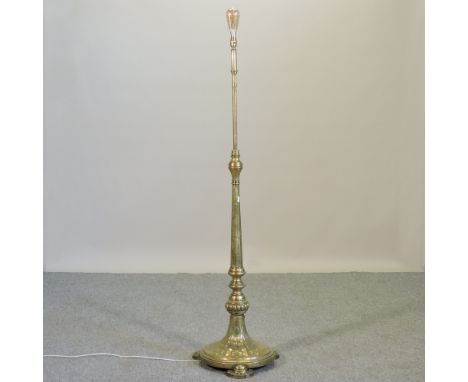 An early 20th century brass standard lamp