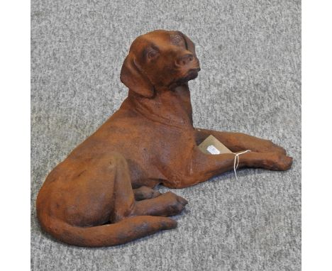 A rusted cast iron model of a dog, 46cm