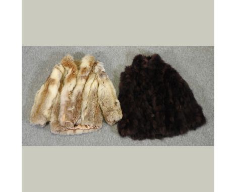A ladies vintage fur coat, together with another