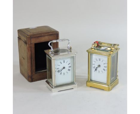 A French brass cased carriage clock, 15cm high, together with a plated carriage clock