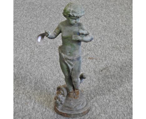 A cast iron model of a cherub, holding a butterfly, 50cm high