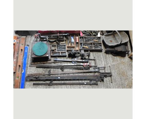 A collection of workshop related tools, vices, drill bits and a gramophone horn