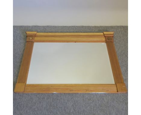 A Regency style gilt painted over mantel mirror, with reeded decoration, 83 x 114cm