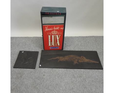 A vintage painted metal Lux German advertising cabinet, fitted with shelves, 68cm high, together with two Museum copies of fo