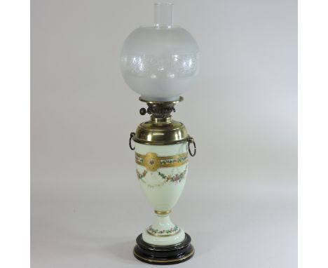 A 19th century French opaline glass oil lamp, with an etched glass shade, 65cm high