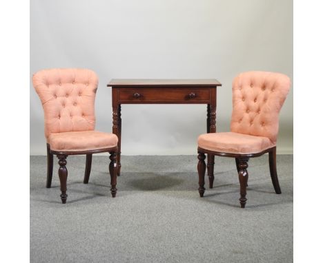 A Victorian mahogany side table, with a single drawer, 80cm, together with a pair of pink upholstered button back side chairs