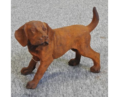 A rusted cast iron model of a puppy, 33cm