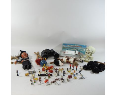 A collection of toys, to include Pelham Puppets, binoculars, a model boat and lead figures