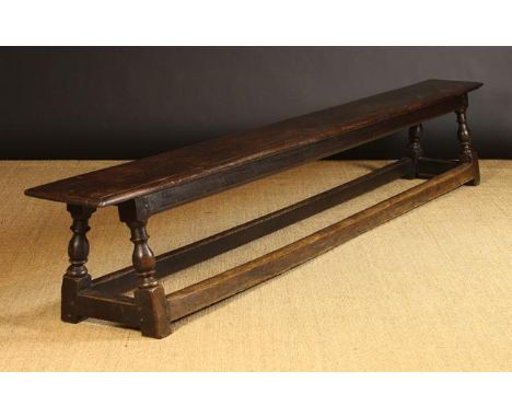 A Long 18th Century & Later Joined Oak Bench Formally from Christ College, Cambridge. The single plank seat with moulded edge