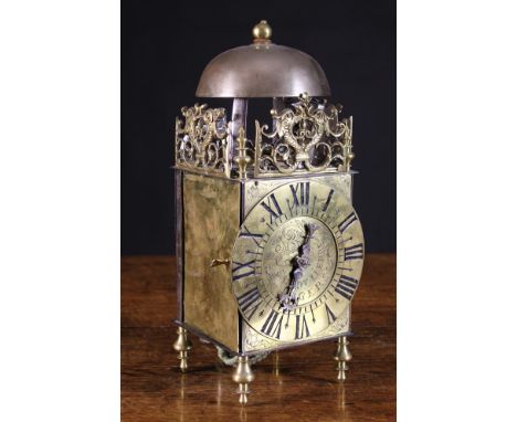 An 18th Century Thirty Hour Brass Lantern Clock Circa 1720.  The centre engraved with maker's name Jean du Lierre Angers amon