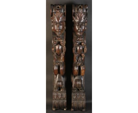 A Pair of Fabulous Late 16th/Early 17th Century Carved Architectural Brackets in the form of satyrs holding vacant cartouches