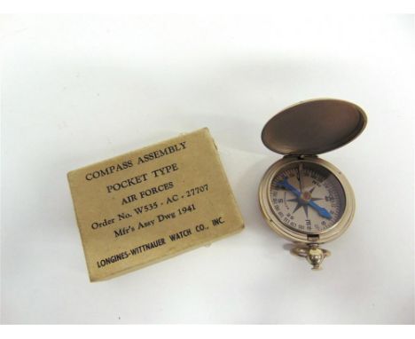 A SECOND WORLD WAR U.S. AIR FORCE POCKET COMPASS by the Longines-Wittnauer Watch Co., nickel plated, the hinged cover stamped