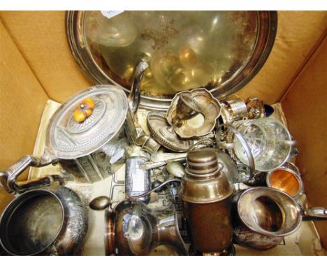 A COLLECTION OF PLATED WARES including: a cocktail shaker; a salver; a teapot; and various flatware