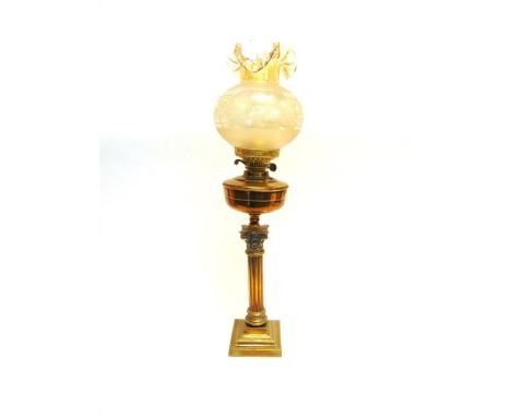A BRASS CORINTHIAN COLUMN OIL LAMP with funnel and shade