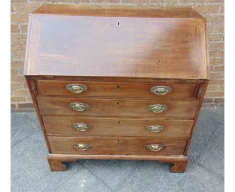 A GEORGE III MAHOGANY BUREAU with fitted interior, four graduated drawers on bracket feet, 102cm wide 55cm deep, 107cm high