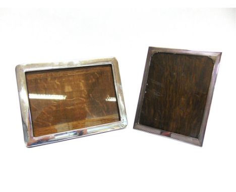 A SILVER PHOTOGRAPH FRAME Birmingham 1927, the rectangular engine turned border with a vacant cartouche, 21.7cm x 16.8cm, ima