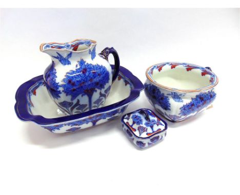 A DOULTON BURSLEM 'TUDOR' PATTERN JUG & BASIN SET, with underglaze blue and red enamelled decoration in the Art Nouveau taste