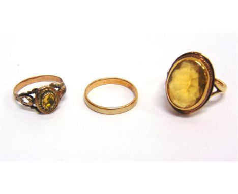 A VICTORIAN STONE SET RING with a citrine dress ring; and a wedding ring