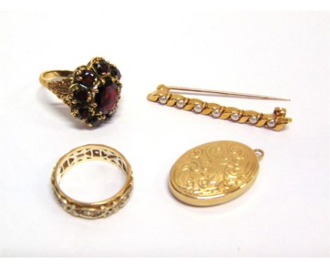 A 9CT GOLD GARNET CLUSTER RING finger size O, a 9ct gold oval locket; a 9ct gold seven stone cultured pearl bar brooch; and a