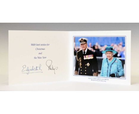 Royal Interest - 2014 Christmas card with twin gilt Royal cyphers to cover, colour photographic print titled 'Naming of HMS Q