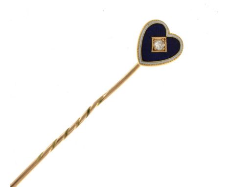 An enamel and diamond set heart stick pin, the old cut diamond to a blue enamel ground with white trim, stamped '18ct' and nu