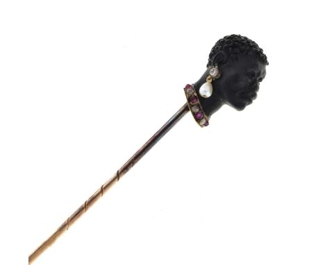 A carved black onyx bust stick pin, the well modelled African head with rose diamond and pearl drop earrings and a ruby and d