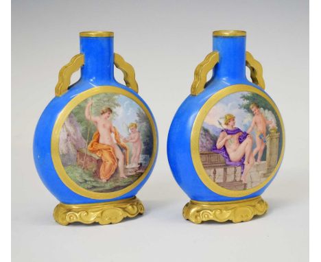 Pair of 19th Century miniature moon flasks, flattened disk form with cylindrical necks, each gilded and painted with classica