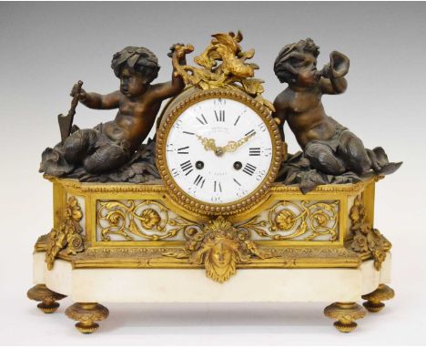 19th Century French bronze, brass and white marble figural two train mantel clock, De Niere, Paris, with 4-inch white-enamell