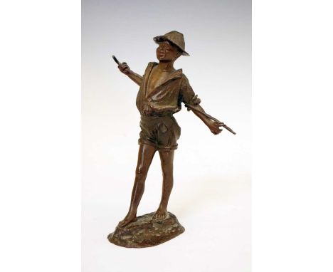 Early 20th Century bronze figure of a peasant boy, striding with straw hat and open shirt, his outstretched arms holding a st