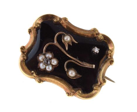 Early Victorian mourning brooch, the panel set with seed pearl and diamond flower to a black enamel ground, the locket back i