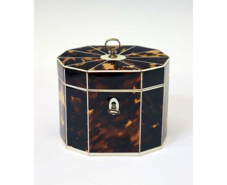 George III tortoiseshell veneered and ivory strung tea caddy, of decagonal form, the hinged cover with ring handle opening to