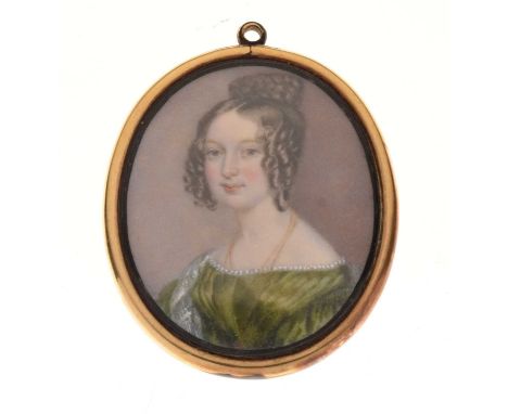 19th Century English School oval portrait miniature of a lady wearing a green dress, painted on ivory, verso having a blue en