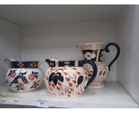 3 vintage hand painted jugs