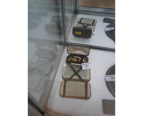 box set of gold cased cufflinks & snakeskin wallet