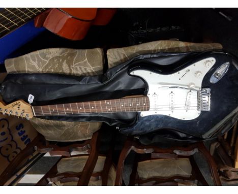 SQUIRE STRAT BY FENDER WITH AMPLIFIER & CASE ON STAND 