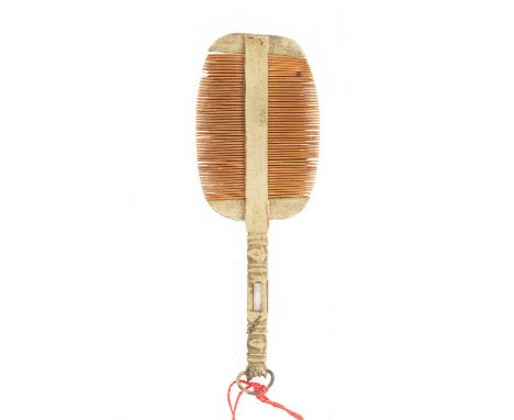 A Chinese miniature double sided white brass pocket comb, circa 1910, 8.6cm long