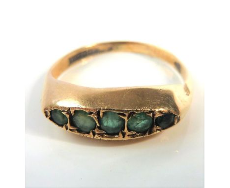 A 9-carat gold ring set with five graduated emeralds (2.2g) (The cost of UK postage via Royal Mail Special Delivery for this 
