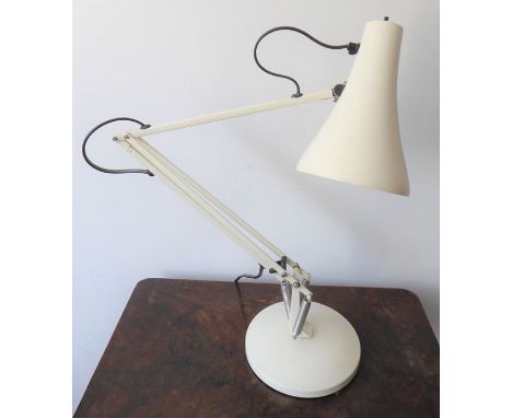 A cream Anglepoise lamp