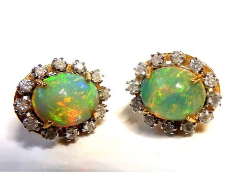 A pair of 18-carat gold, opal and diamond cluster earrings&nbsp;(The cost of&nbsp;UK postage&nbsp;via Royal Mail Special Deli